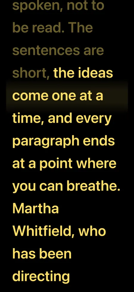 LOIGO reading screen: amber text on black with the line being read highlighted.