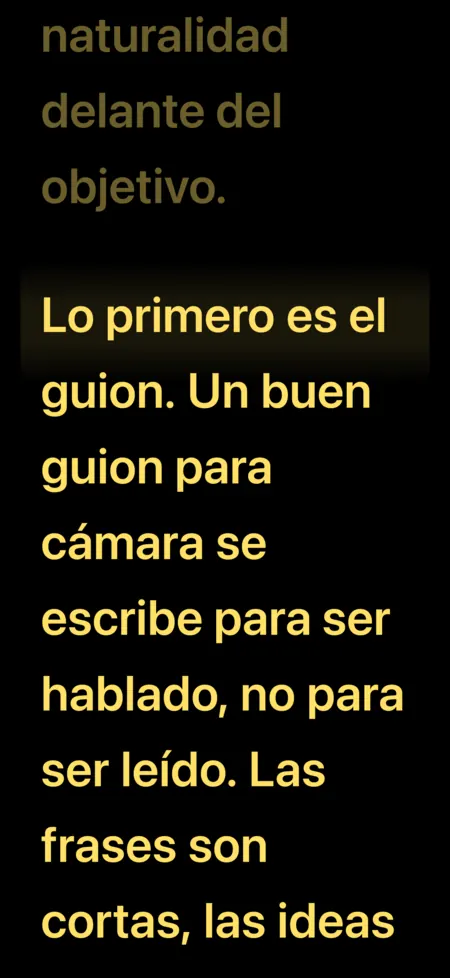 Pantalla de lectura de LOIGO: texto en ámbar sobre negro con la línea que se lee resaltada.